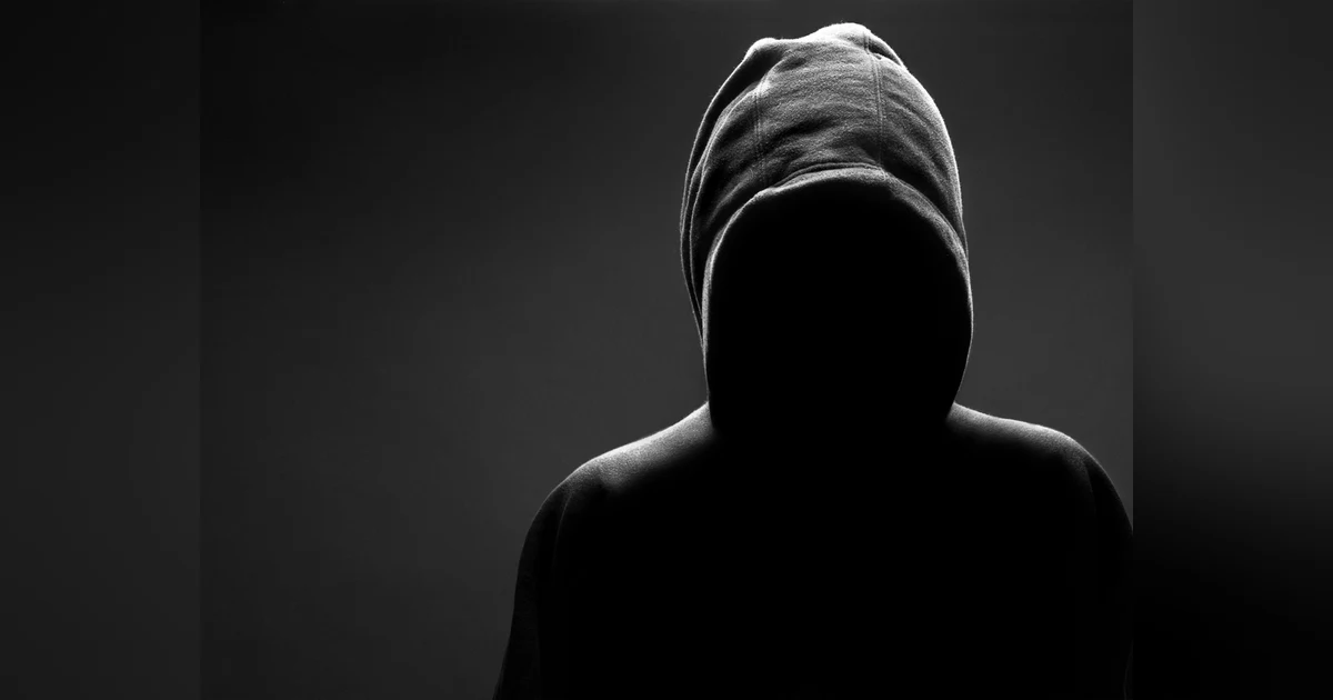 Hooded Figure Standing Over Me