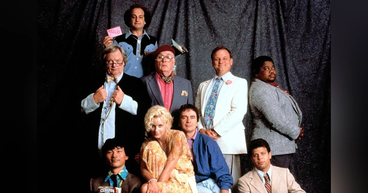 Crazy People (1990) - with sportscaster A.M. Pfeffer