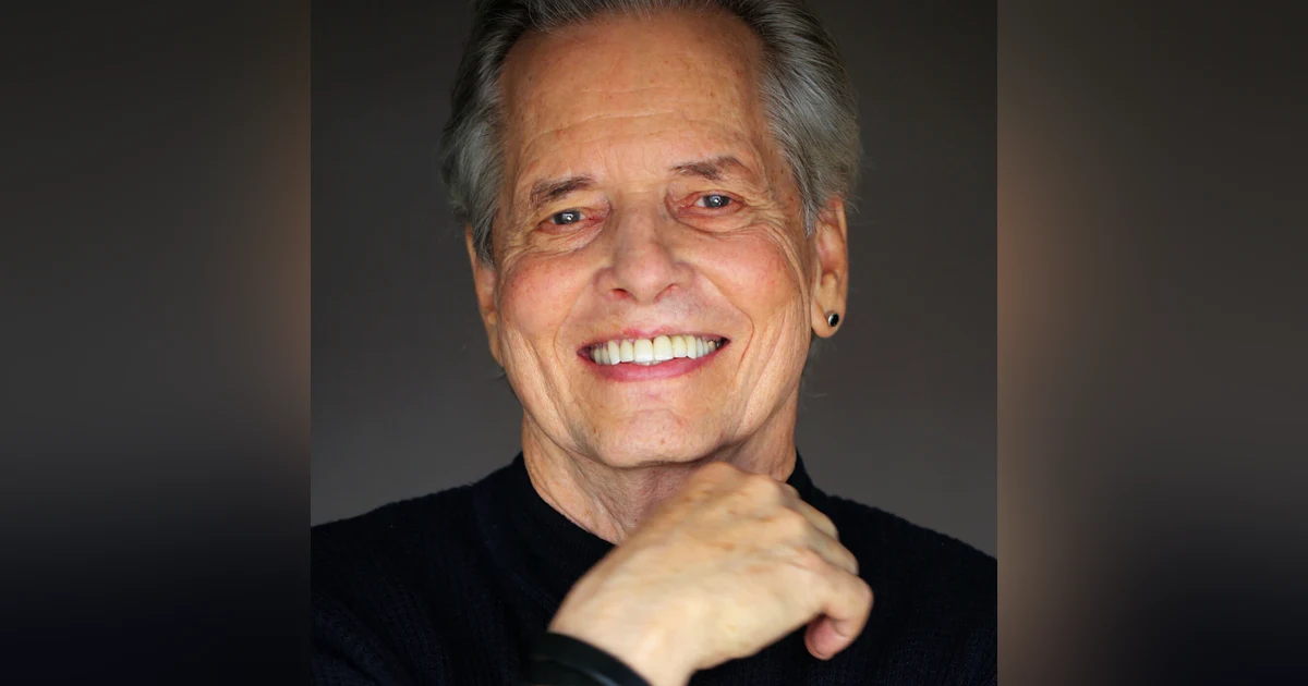 Mark W. Travis